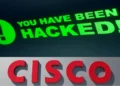 Photo of the CISCO logo and text saying "You have been hacked!"